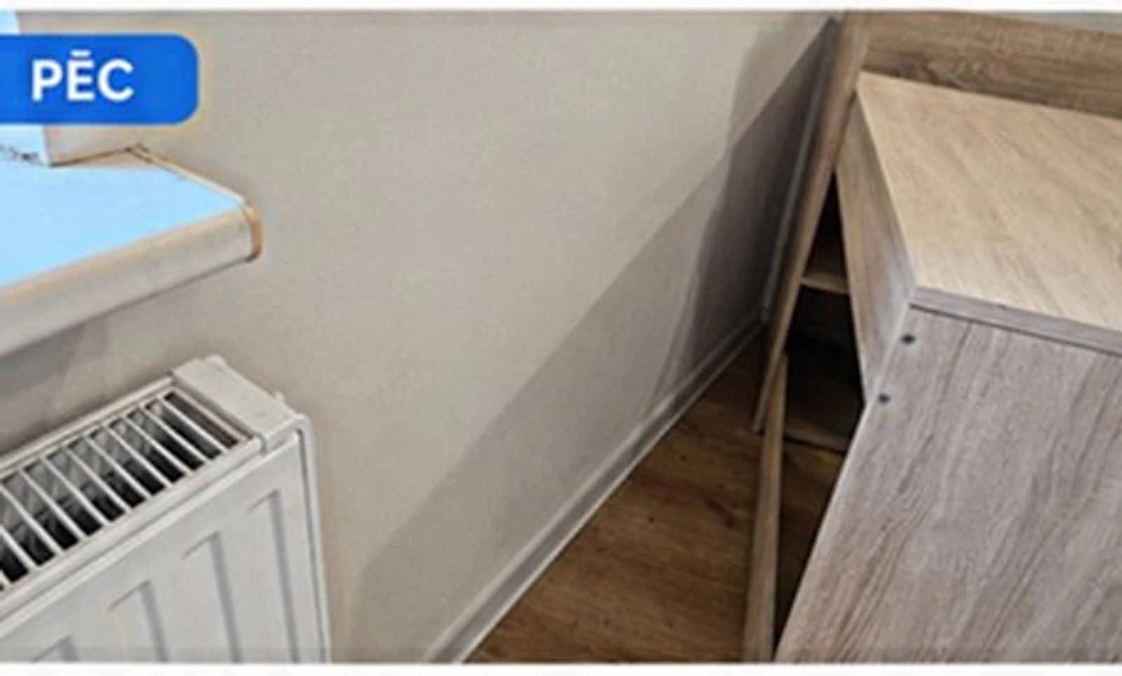 Wall and radiator after mould removal — After